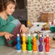 Nins, Cubiletes y Monedas - juego de madera del color del arcoiris