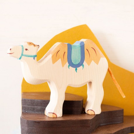 Camello con silla para montar - animal de madera