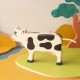 Vaca blanca y negra - Animal de granja de madera