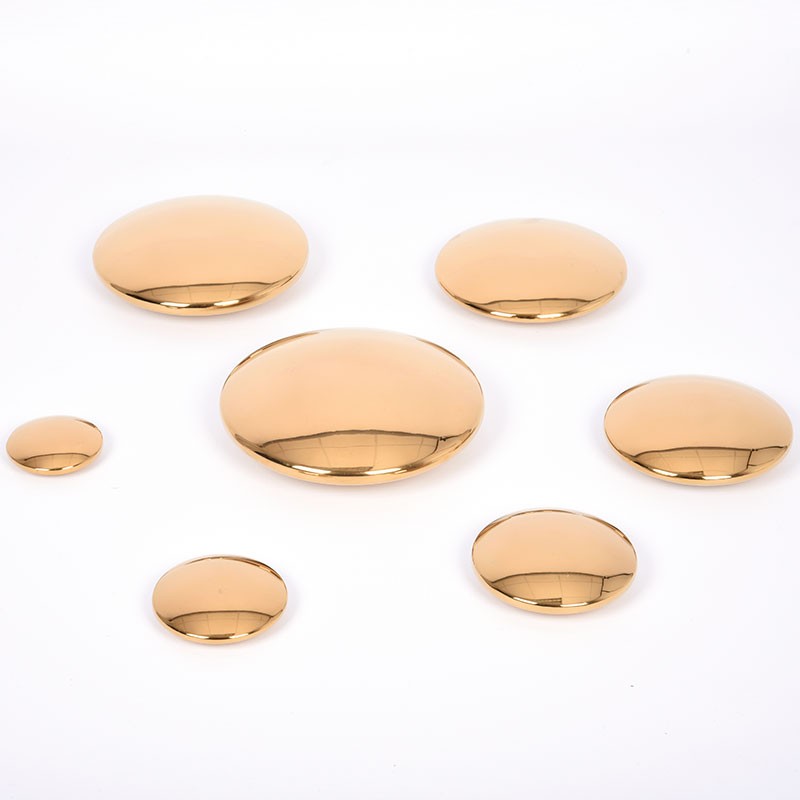 Discos sensoriales reflectantes dorados - 7 piezas