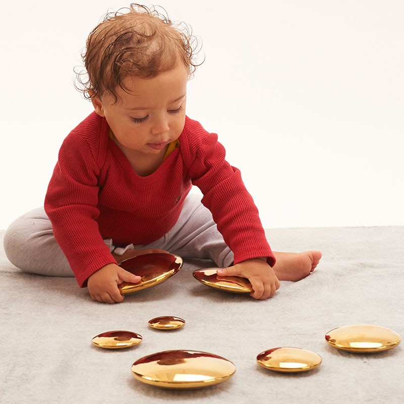 Discos sensoriales reflectantes dorados - 7 piezas