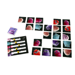 Atrapa Monstruches: tarjetas cuadradas de cartón con monstruos de colores vibrantes y un tablero de juego.