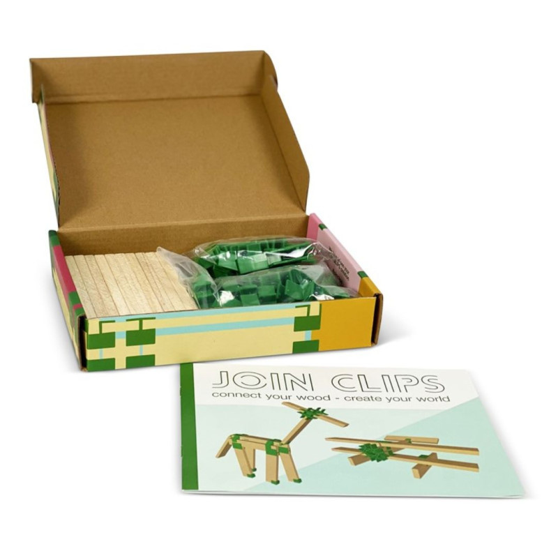 Set de construcción Join Clips con tablillas de madera y conectores verdes en caja de cartón, junto a un manual ilustrado.