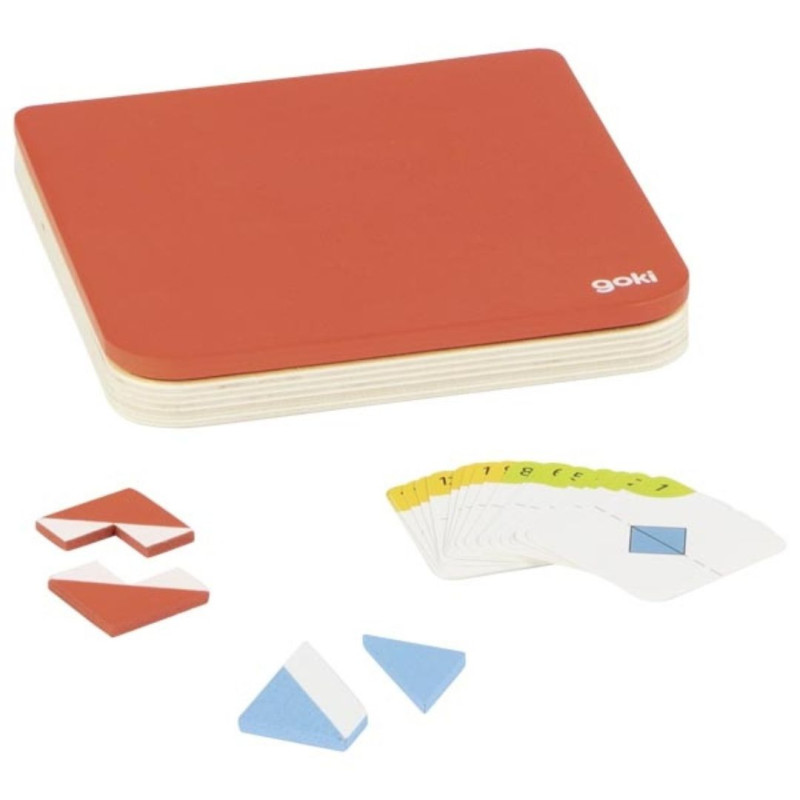 Juego de simetría con estuche rojo, piezas geométricas de madera en rojo y azul, y tarjetas blancas con retos visuales.