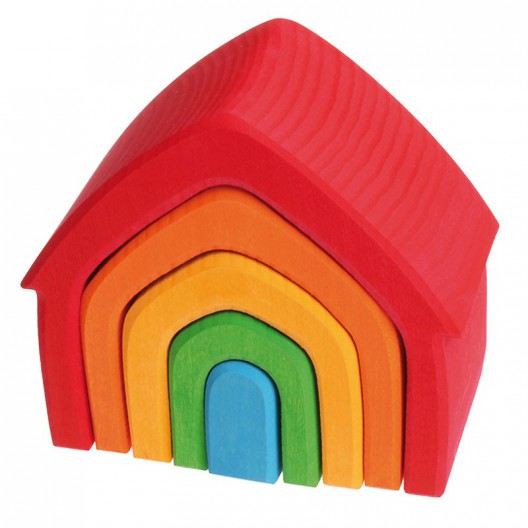 Casa Apilable de fusta amb colors de l'arc de Sant Martí
